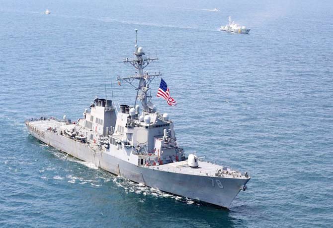 U.S. Navy fires warning at Iranian ships in Persian Gulf