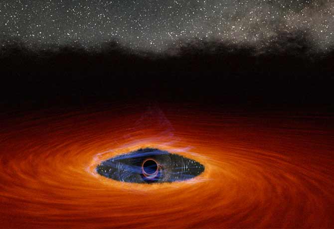 Astronomers detect light behind black hole