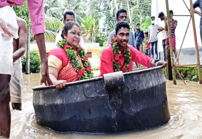 Bride and groom reach wedding hall in cooking vessel