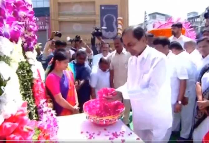 CM KCR paying floral tributes toMahatma Gandhi at MG Road