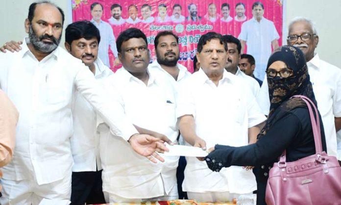 MLA nallamothu Bhaskar rao distributes Kalyana Lakshmi checks