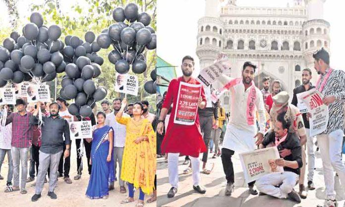 Singareni workers protest with black badges against Modi