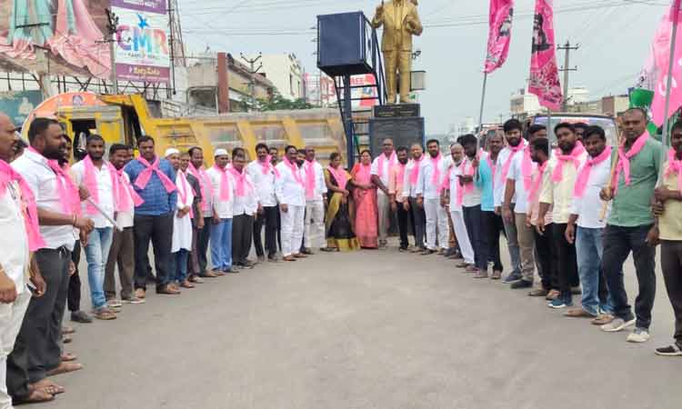TRS Activists protest against IT Raids on Malla Reddy House