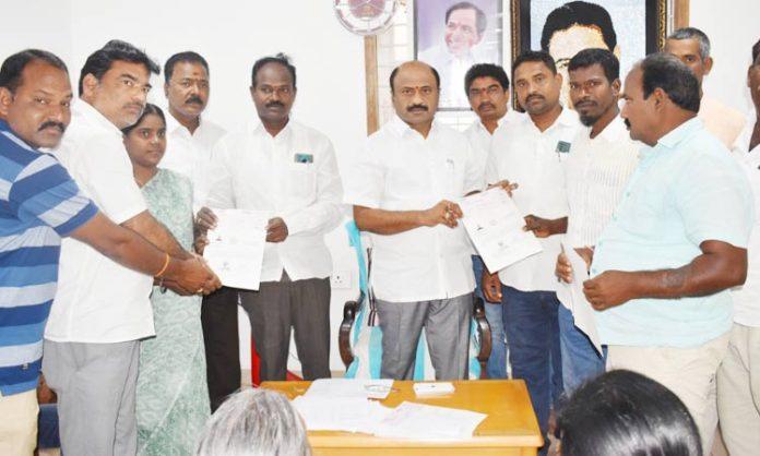 MLA Challa Dharma Reddy presented CMRF cheques