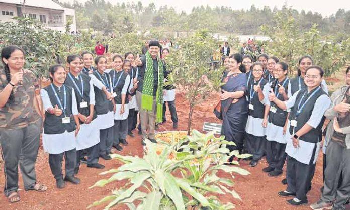 MP Santhosh planted saplings in Mulugu forest college