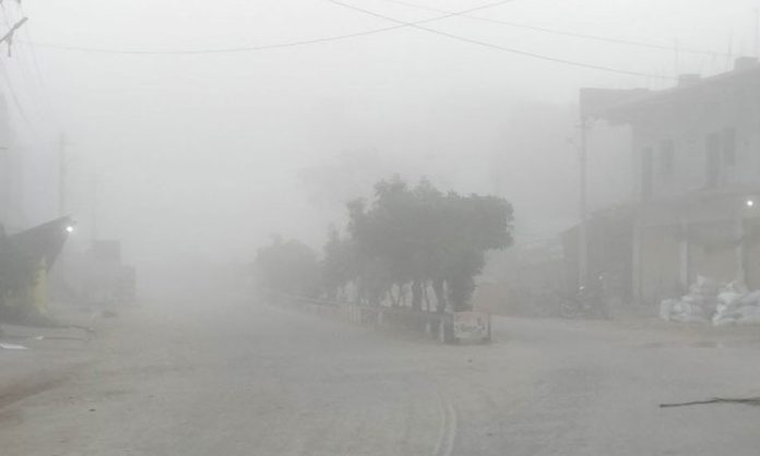 Masaipet mandal covered by smoke and snow