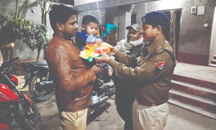 Railway staff return the toy to child who lost it