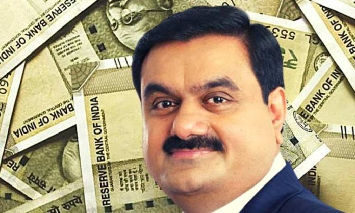 Adani networth down