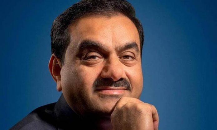 Adani stocks fall