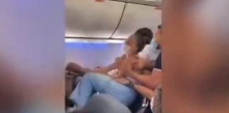 Passengers fight for window seat on plane
