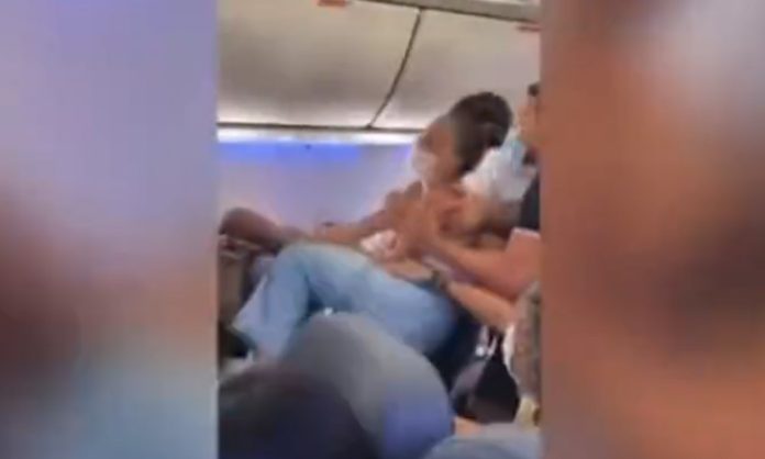 Passengers fight for window seat on plane