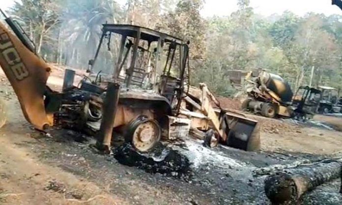 Naxals set fire to road construction machinery