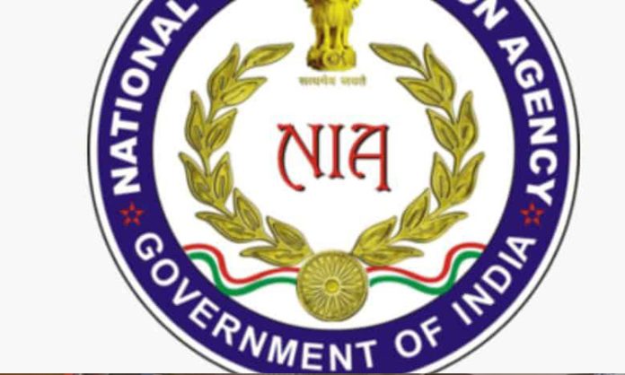 NIA takes custody of 4 PFI members