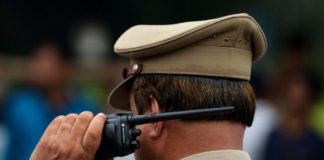 UP Police provide mosquito repellent to woman