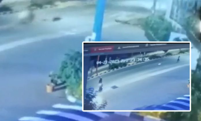 Women jump from bike rider
