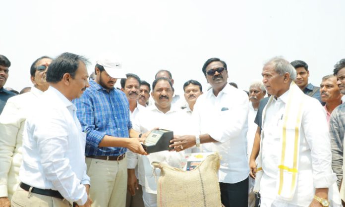 Minister Puvvada inaugurates grain procure center