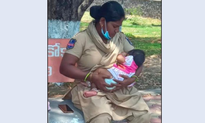 Constable who caressed baby until baby's mother wrote exam