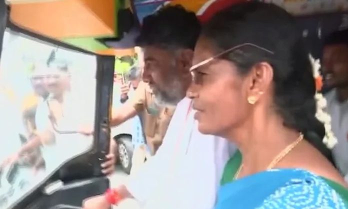 Congress leader DK Shivakumar drives an auto