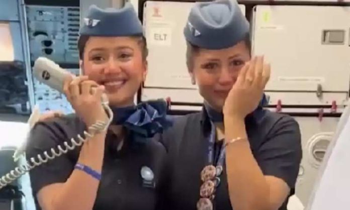 Mother and Daughter as Cabin Crew in flight