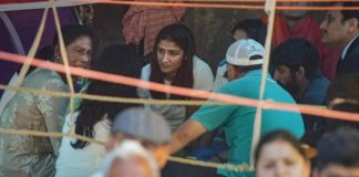 PT Usha sports women wrestlers at protest venue