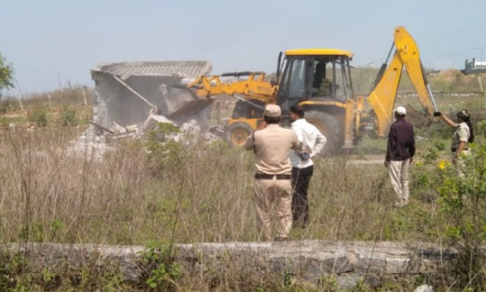 HMDA demolish illegal buildings
