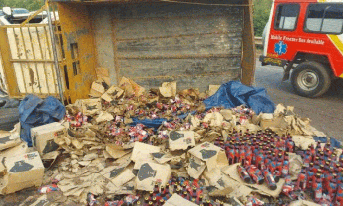 Beer bottles lorry capsize