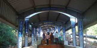Tirumala devotees take sticks
