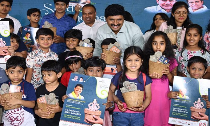 MP Santhosh presented the seed Ganapati idols to the children
