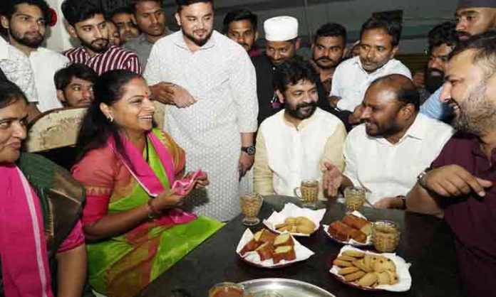 MLC Kavitha drinking chai with people