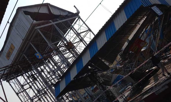 Collapsed water tank on platform