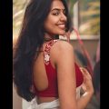 Shivani Rajasekhar stylish look in white saree on red top
