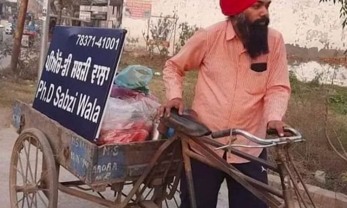 Professor selling vegetables