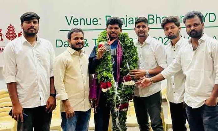 Silver medal for Banoth Vinod Naik in Thailand Taekwondo Games