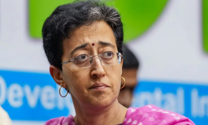 Election Commission Show Cause Notice to Atishi