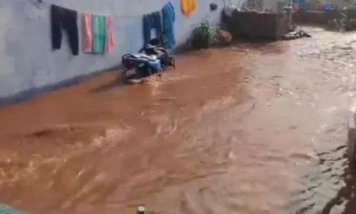 broken Nizam Sagar canal embankment