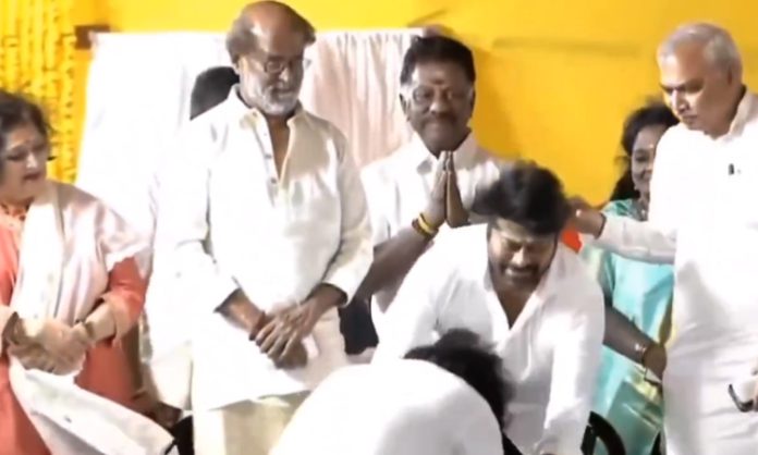 Pawan Touches Chiranjeevi Feet after Ceremony-in
