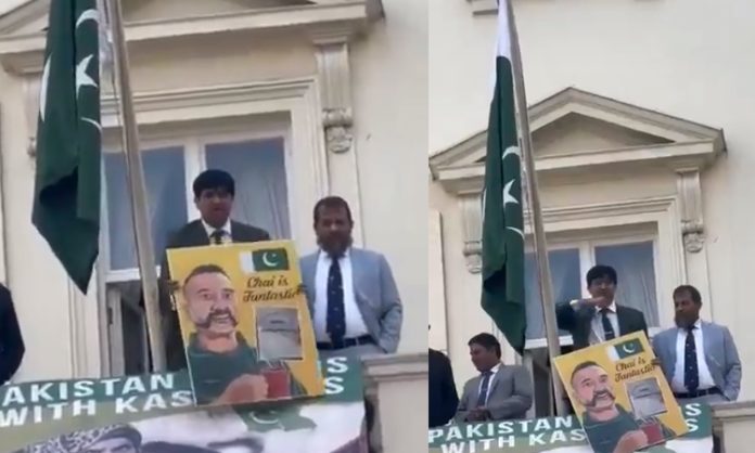 Pak Officer Signals That He Cut Throats