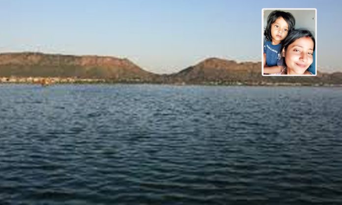 mother throws child into lake