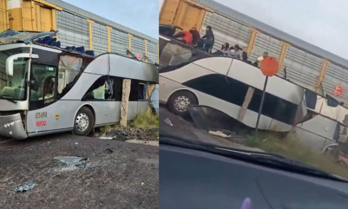 Double-decker bus hit train